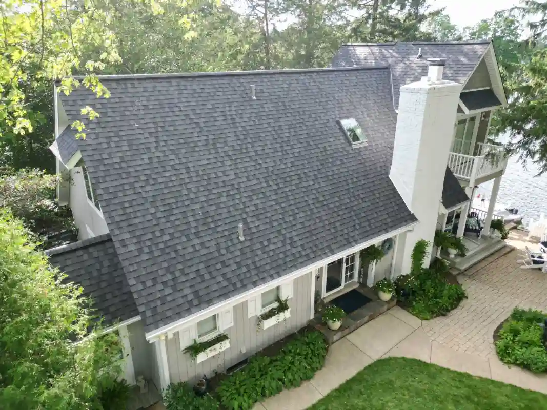 Finished roof replacement project with new shingles installed