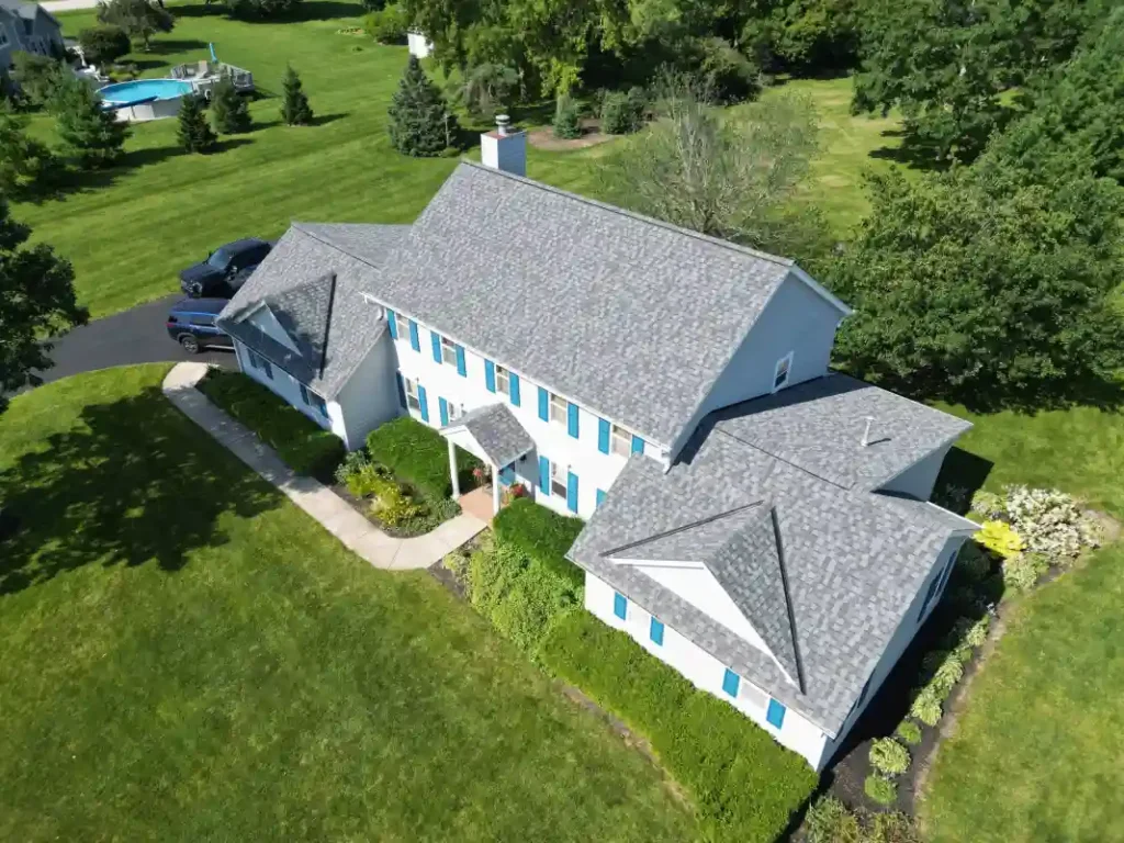 Finished residential roofing project with upgraded shingles and exterior improvements Finished residential roofing project with upgraded shingles and exterior improvements