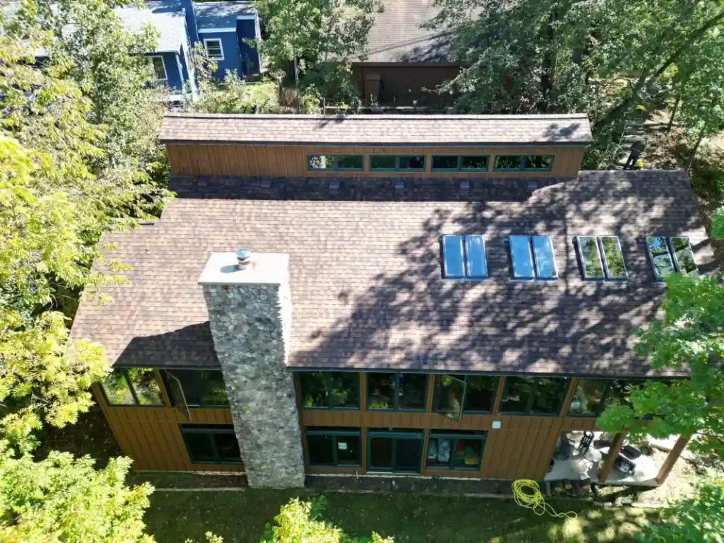 Finished roof replacement with high-quality shingles installed Finished roof replacement with high-quality shingles installed