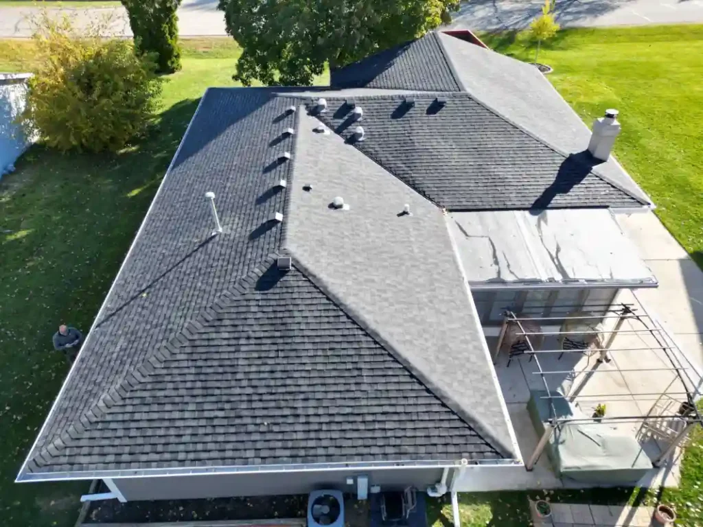 Completed residential roofing project with new shingles installed Completed residential roofing project with new shingles installed