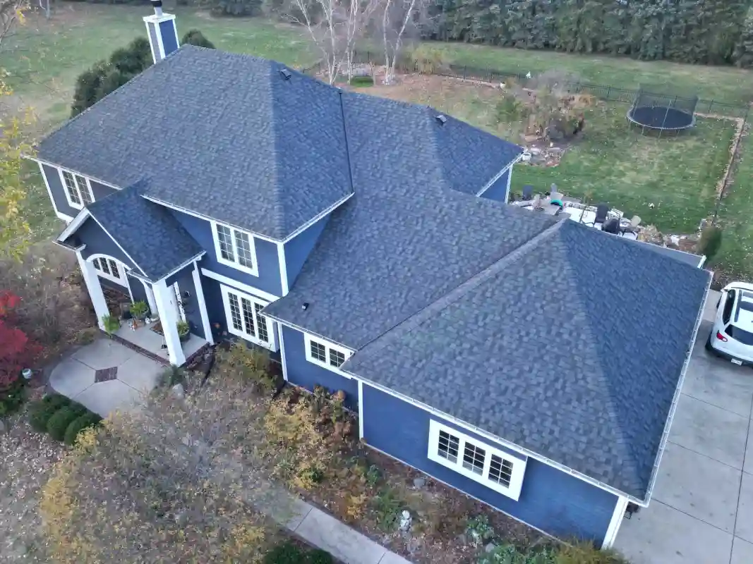 Completed residential roof replacement in Wisconsin with new shingles installed