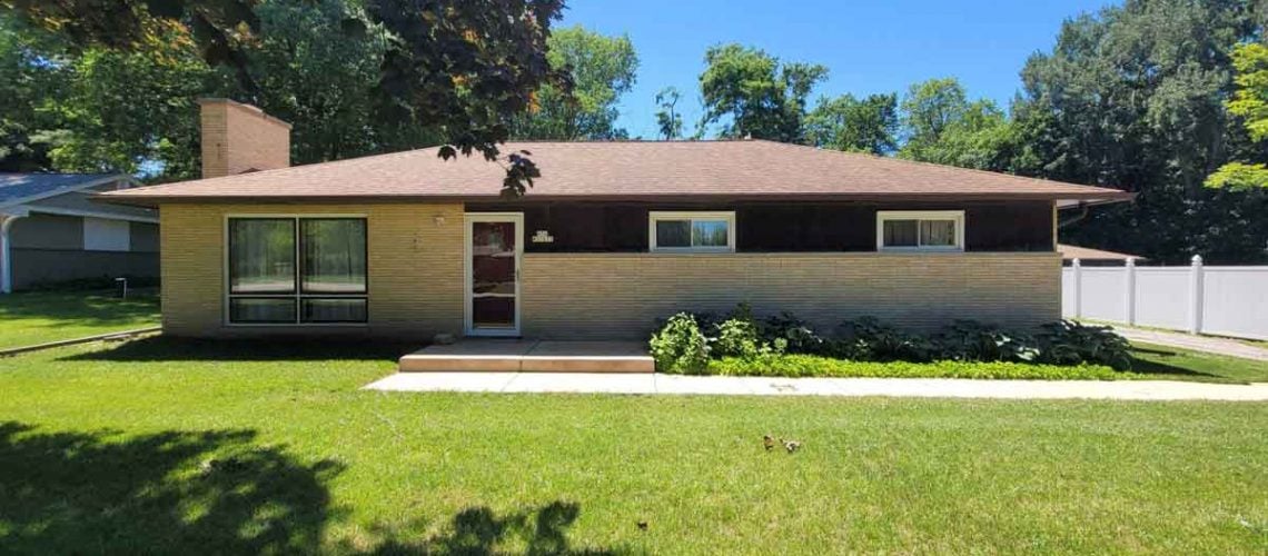 Before image of residential roof showing condition prior to roofing work