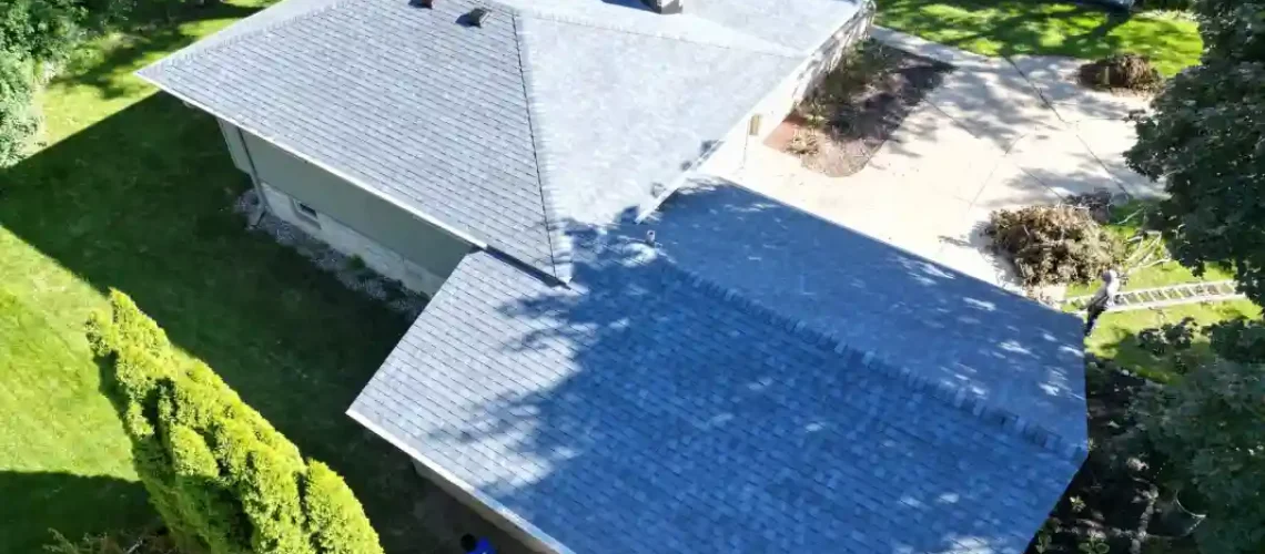 Roofing project showing before and after improvements on residential home