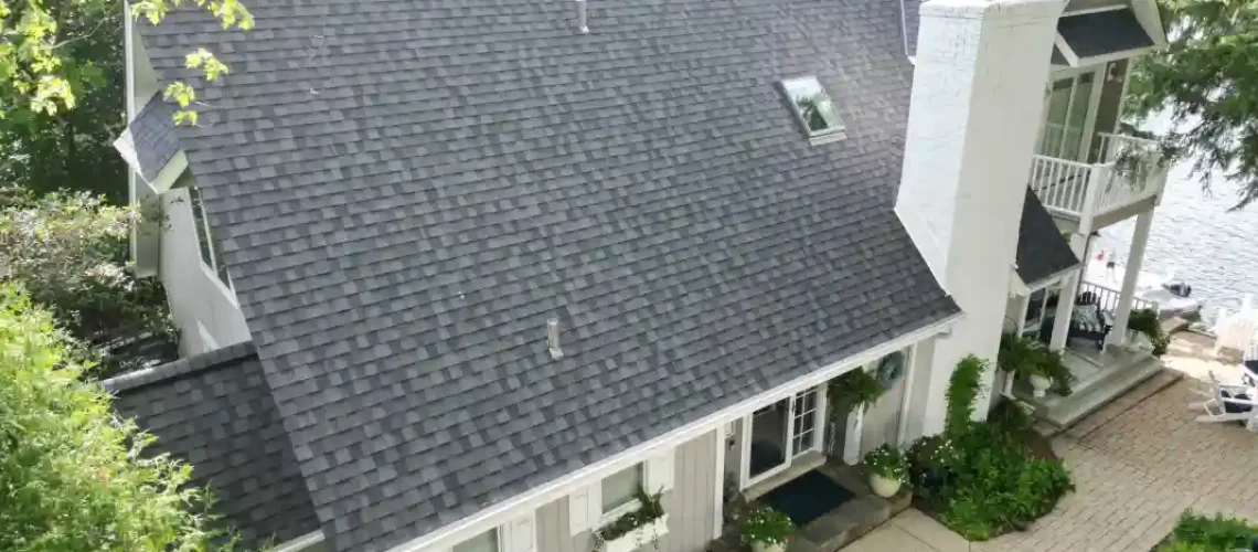Finished roof replacement project with new shingles installed